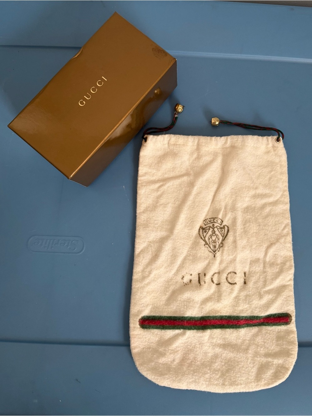 Gucci White Drawstring Pouch with Green & Red Web Stripe.
